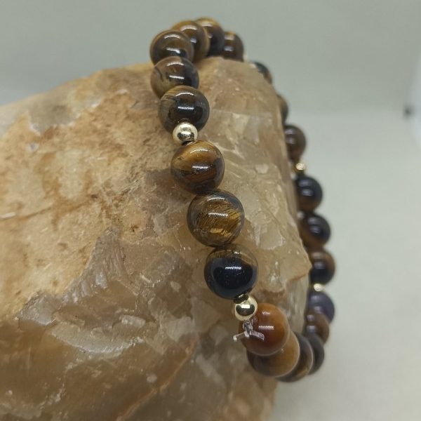 Pulsera ojo de tigre y oro 14 k