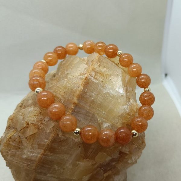 Pulsera Piedra solar y oro de 14 k