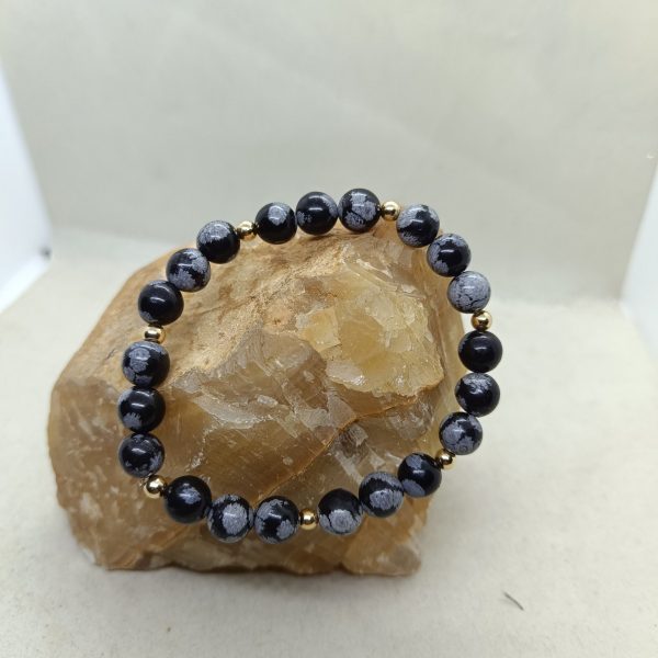 Obsidiana nevada y oro