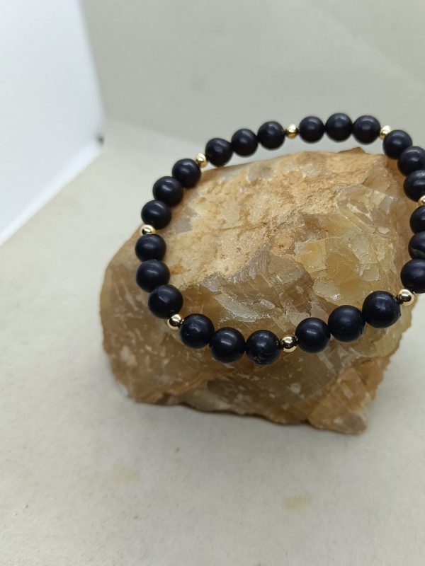 Pulsera Sughnita y oro de 14 k